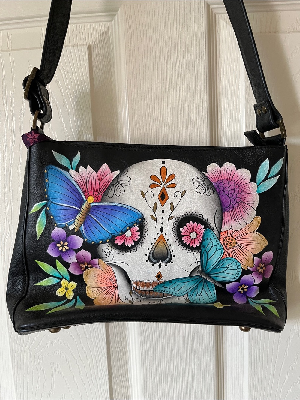 Anuschka Black Crossbody with Colorful Floral, Butterfly & Skull Art - Picture 2 of 7